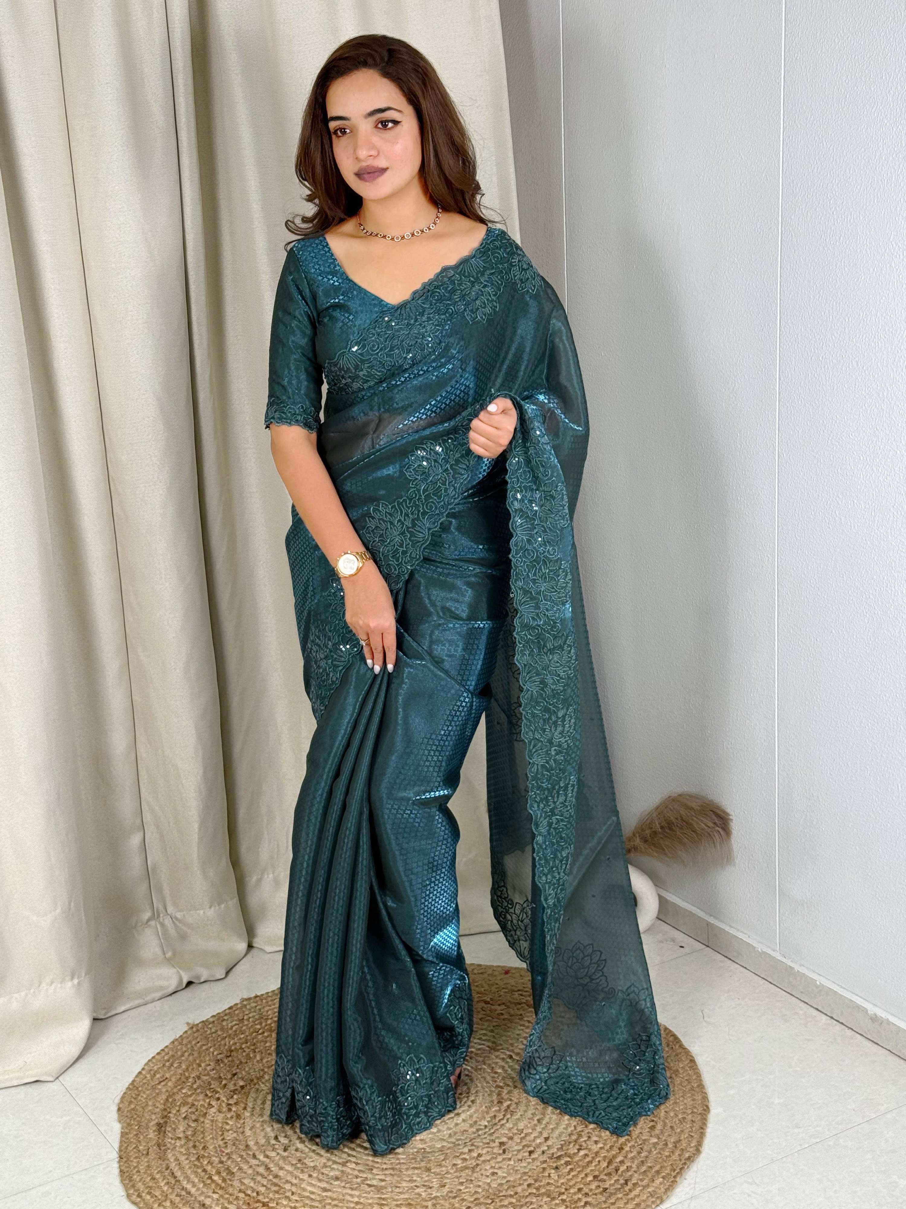Evanik Teal Glass Satin Jecquard Weaving With Thread Sequence Work Saree With Blouse